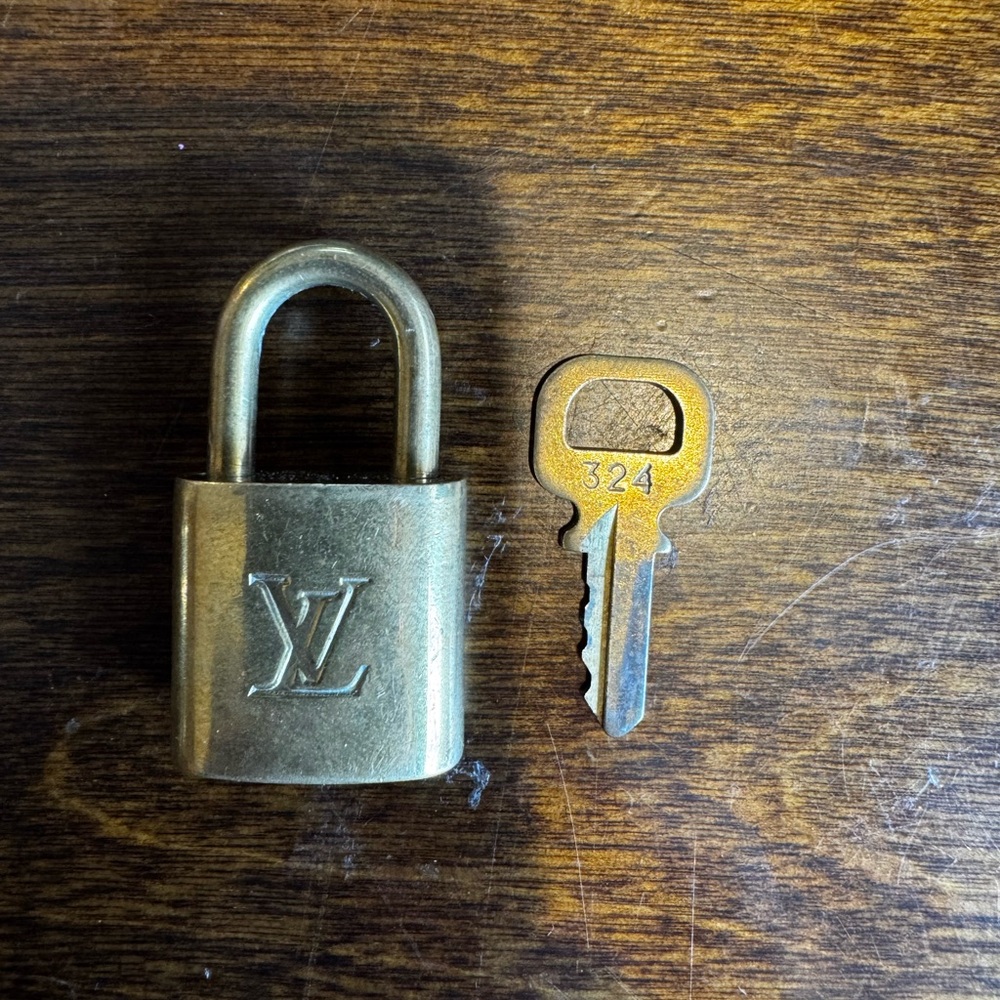 Louis Vuitton Authentic Gold Padlock with Key 300 Series